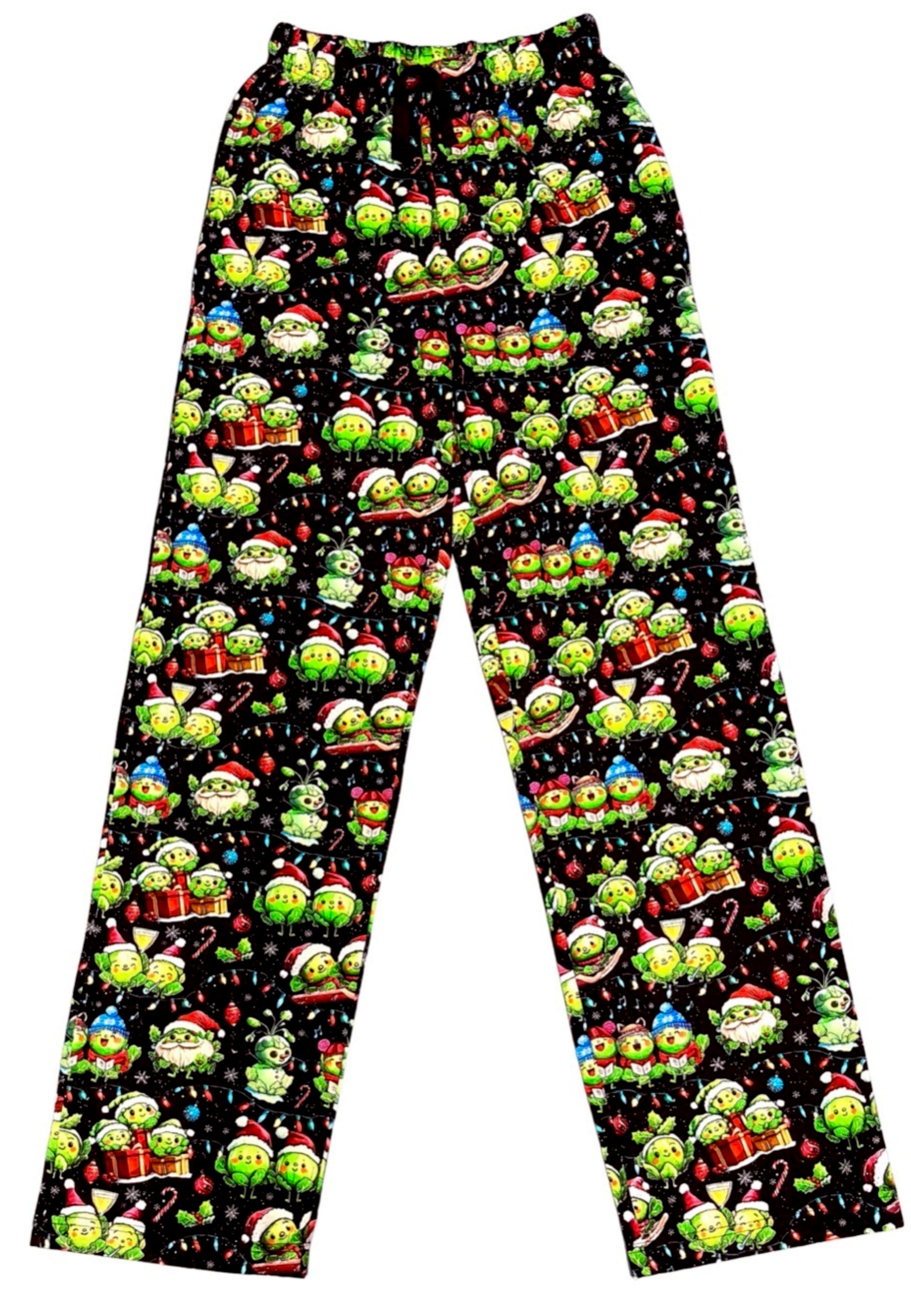 Lounge pants trousers as a flat lay on white background. Bright festive print of cute Christmas sprouts. 