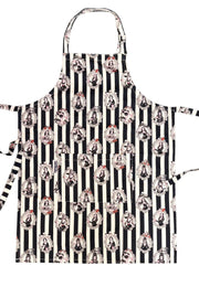 Black and white striped apron with a gothic print of all the old school female ghouls…Morticia, Wednesday, Lily Munster, Vampira, Worst Witch. Apron on a plain white background. 
