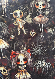 Gothic fabric pattern featuring illustrated dolls, skulls, spiders, bones, and web motifs on a dark background.