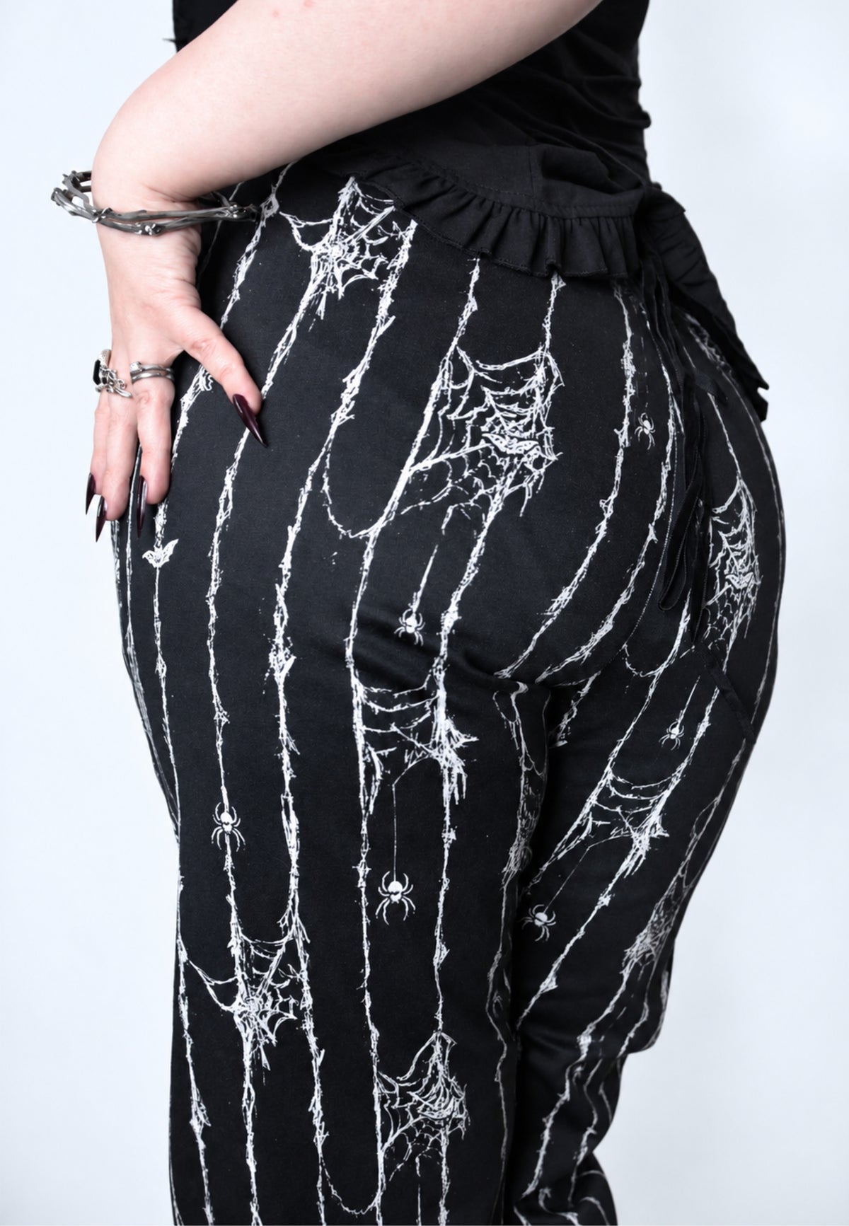 Spiderweb Pinstripe Trousers. Spinstripes.