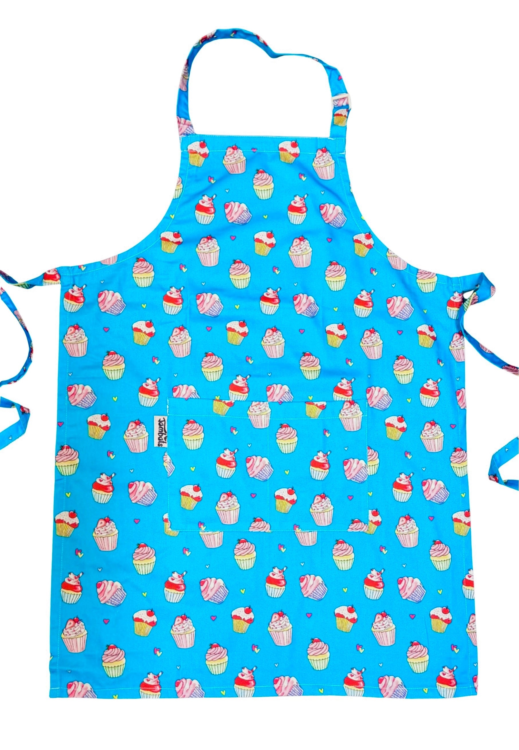 Vibrant blue apron with a print of kawaii cupcakes. Apron on a white background. 