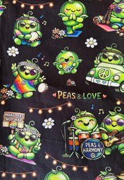 A close-up of a black fabric featuring a colorful retro pattern of green cartoon peas playing music, driving a white van, and surrounded by flowers, musical notes, and the text 'PEAS & LOVE'.
